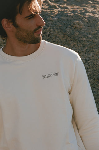 Unisex organic cotton sweater featuring Tom Jean Webb’s “Calling” artwork in blue and sand tones. Lightweight fleece inner, relaxed fit, biodegradable and ethically made in Portugal.