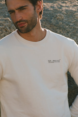 Unisex organic cotton sweater featuring Tom Jean Webb’s “Calling” artwork in blue and sand tones. Lightweight fleece inner, relaxed fit, biodegradable and ethically made in Portugal.